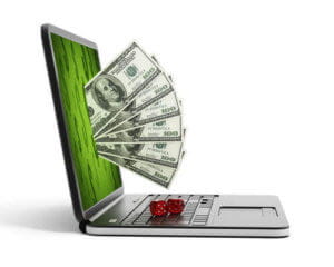 Online Casino Sic Bo dices on a laptop 