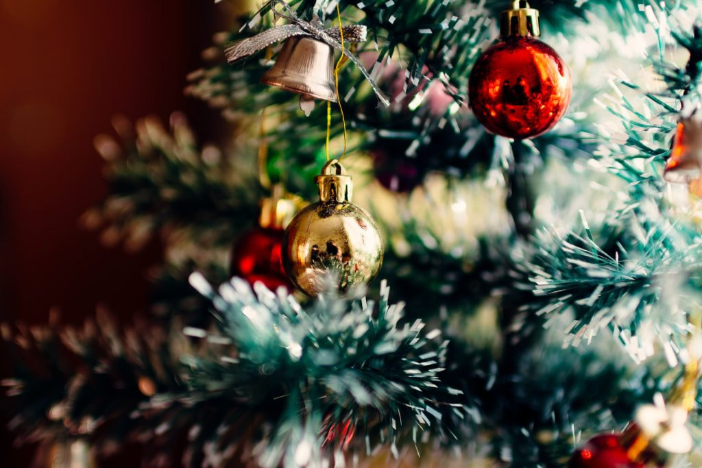 Christmas tree with Christmas balls on it.